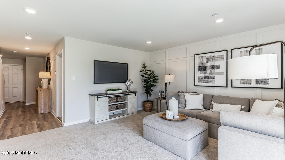 4 Bay Breeze Drive Waretown, NJ 08758 - Photo 3 of 30 a living room with furniture and a flat screen tv