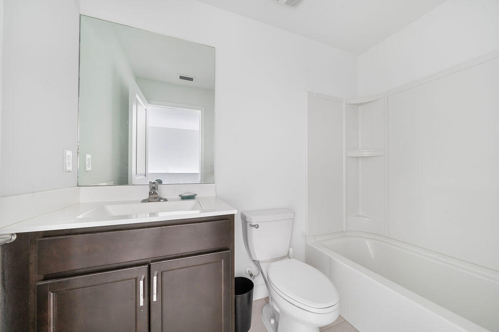 2004 Sugar Maple Drive Riviera Beach, FL 33410 - Photo 11 of 37 Guest Bathroom