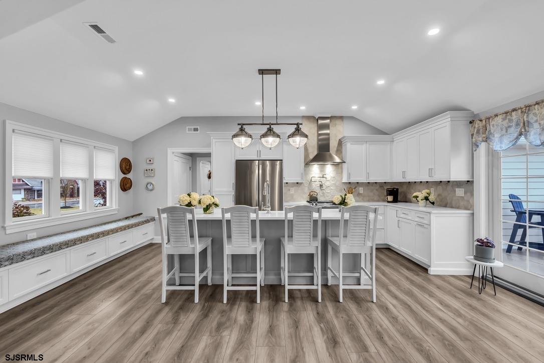 1610 Shore Road Linwood, NJ 08221 - Photo 17 of 46 a view of a dining room with furniture window and wooden floor