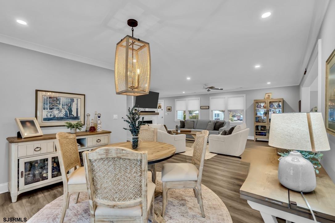 1610 Shore Road Linwood, NJ 08221 - Photo 22 of 46 a living room with fireplace furniture and a wooden floor