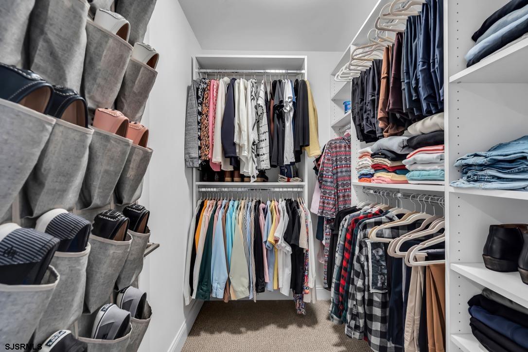 1610 Shore Road Linwood, NJ 08221 - Photo 27 of 46 a view of walk in closet with clothes and shoes