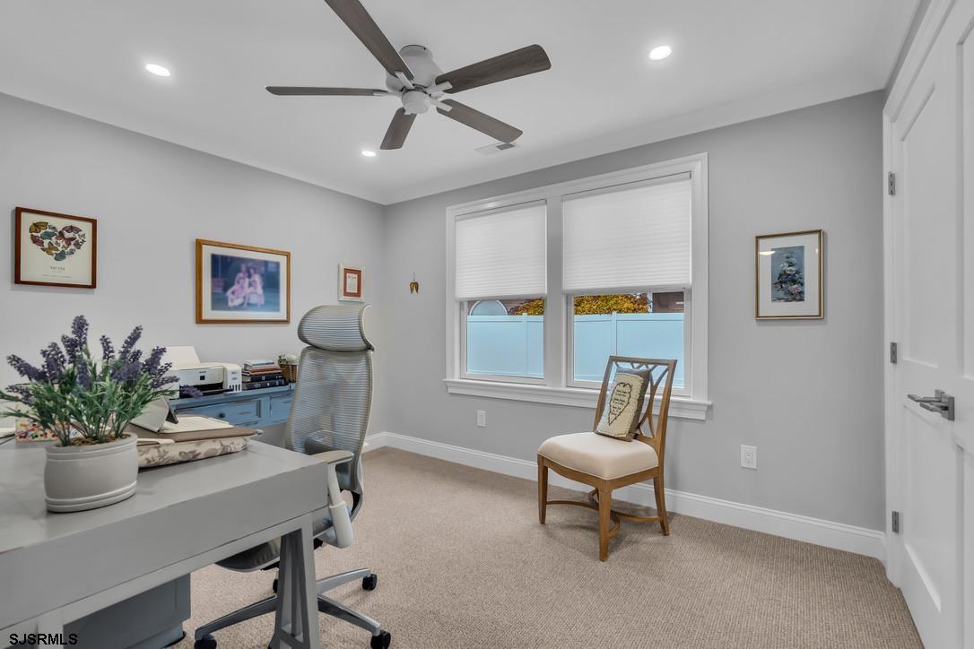 1610 Shore Road Linwood, NJ 08221 - Photo 30 of 46 a living room with furniture and a potted plant