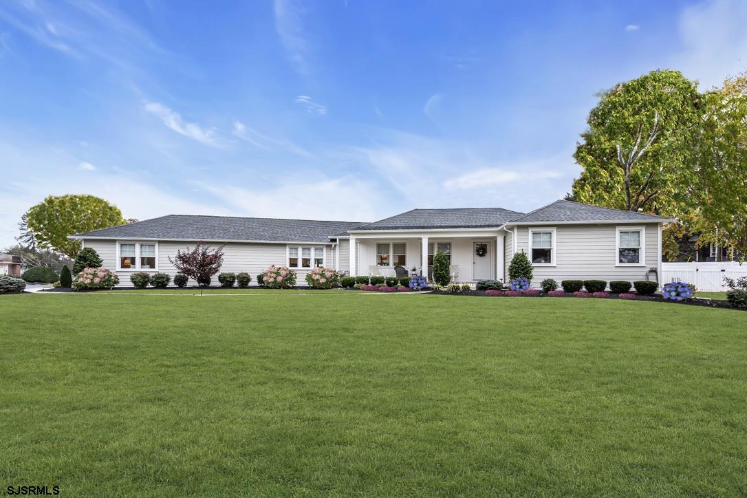 1610 Shore Road Linwood, NJ 08221 - Photo 46 of 46 a front view of a house with a garden
