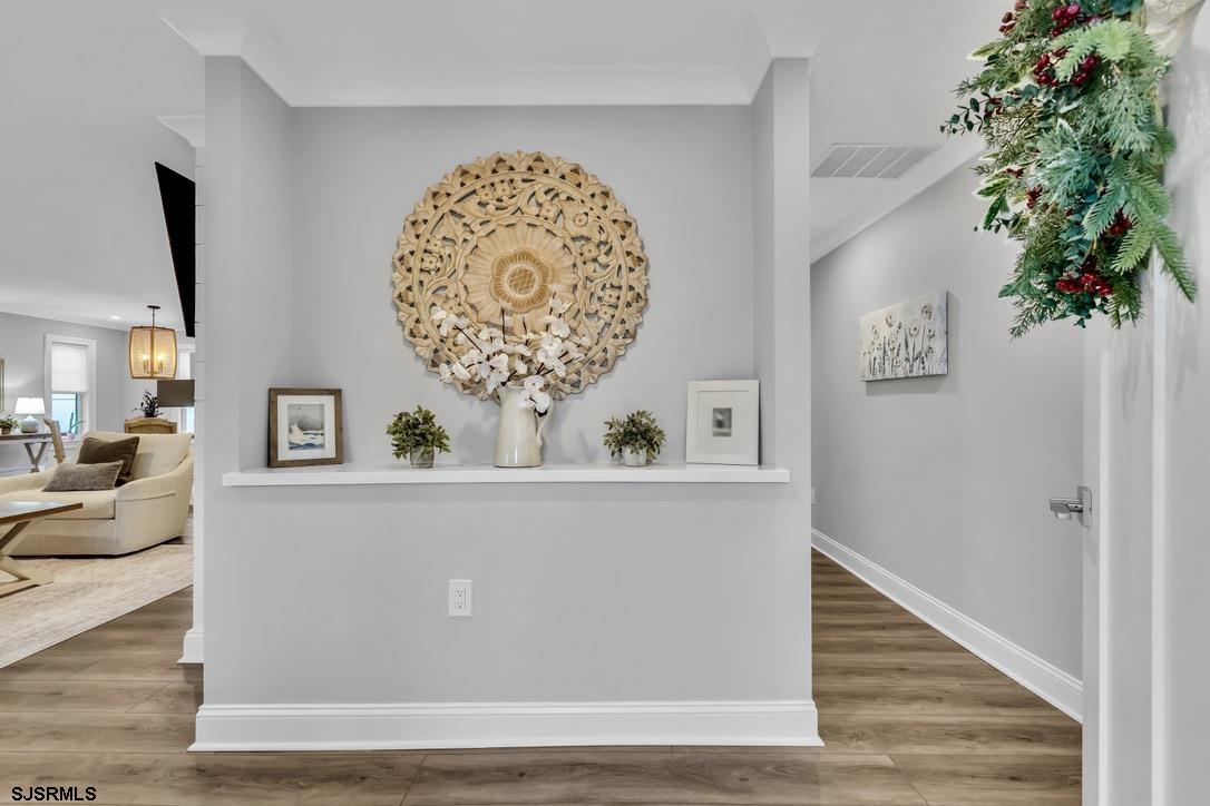 1610 Shore Road Linwood, NJ 08221 - Photo 5 of 46 a view of a hallway with wooden floor
