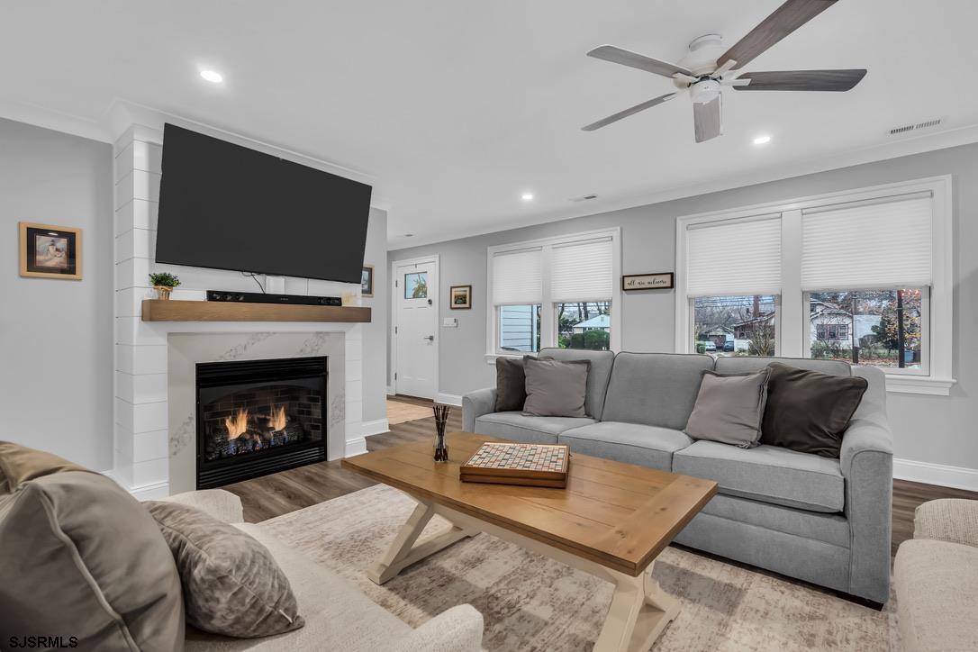 1610 Shore Road Linwood, NJ 08221 - Photo 9 of 46 a living room with furniture and a fireplace