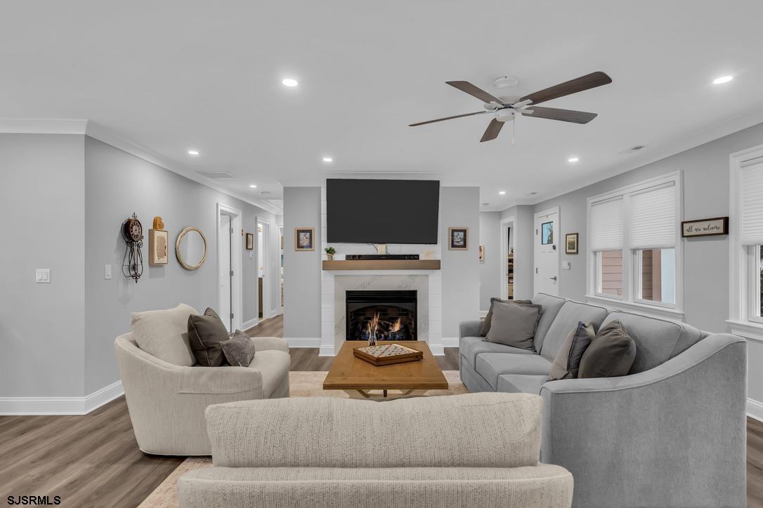 1610 Shore Road Linwood, NJ 08221 - Photo 10 of 46 a living room with furniture and a fireplace