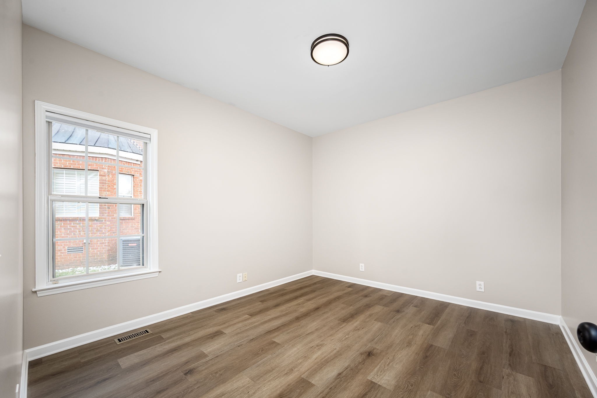 339 Calumet Trace Murfreesboro, TN 37127 - Photo 20 of 24 an empty room with wooden floor and windows