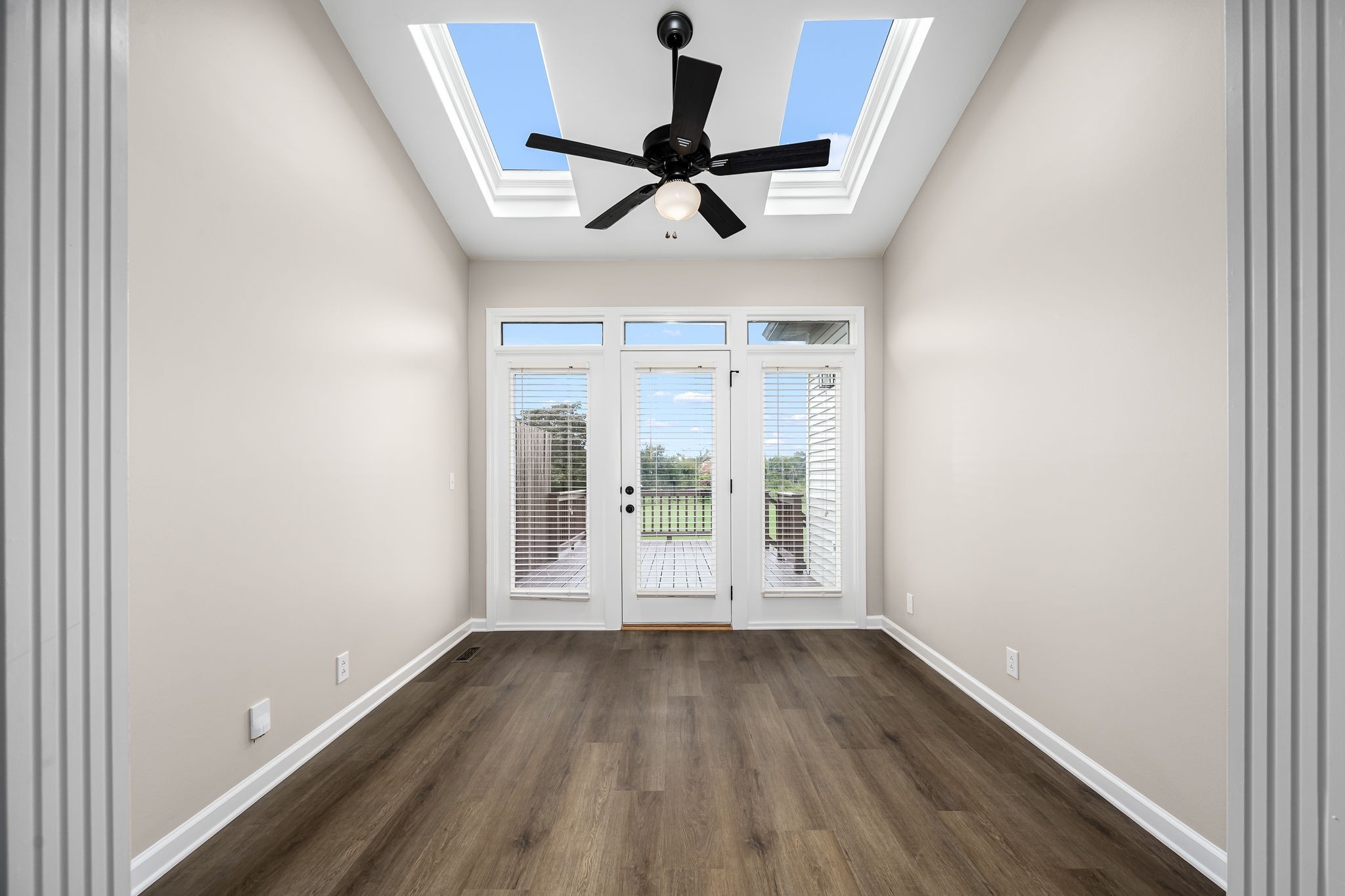 339 Calumet Trace Murfreesboro, TN 37127 - Photo 8 of 24 an empty room with wooden floor and windows