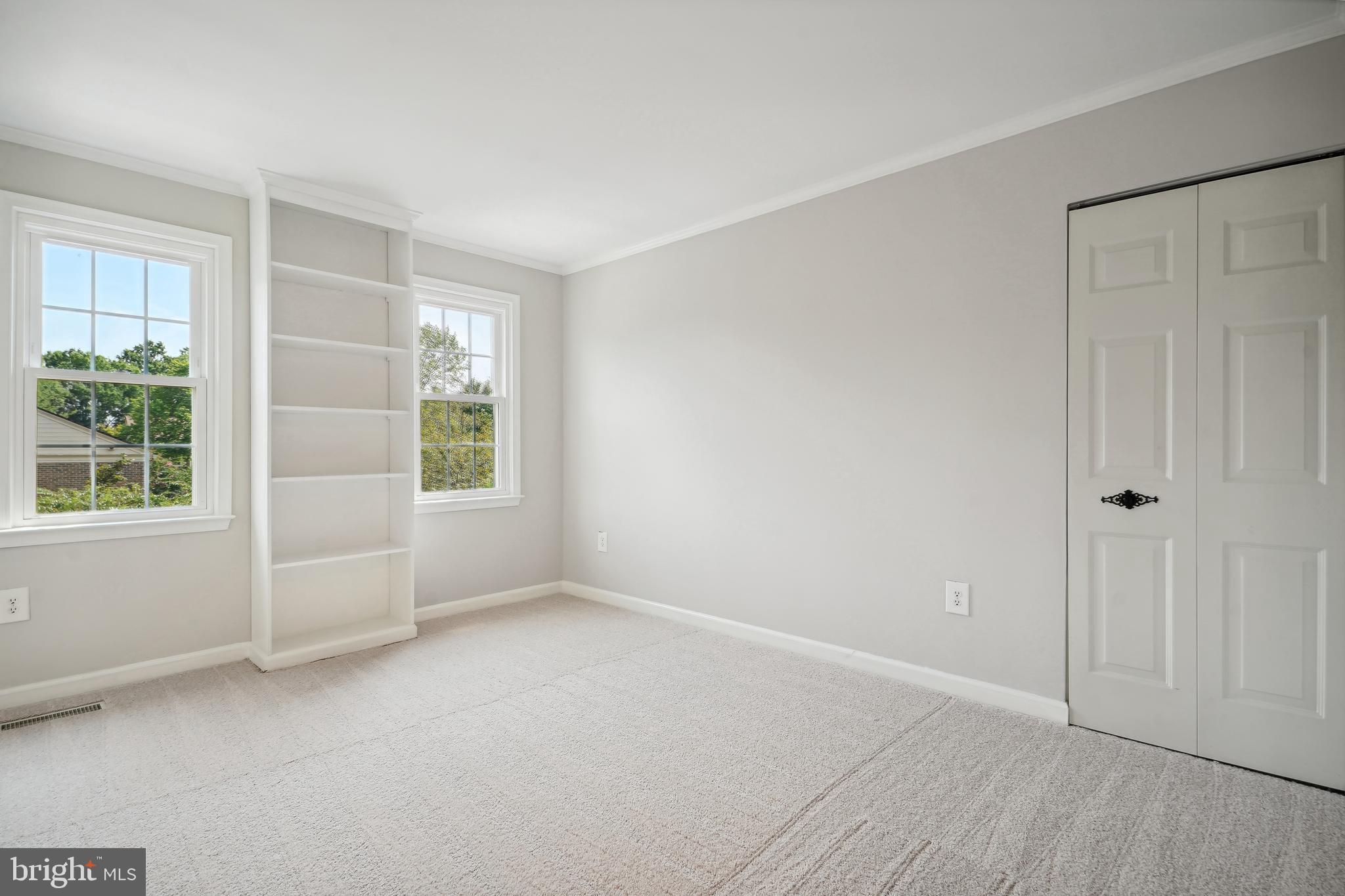 5809 Tudor Lane Rockville, MD 20852 - Photo 18 of 42 2nd Bdrm - built-in shelves, 3 closets