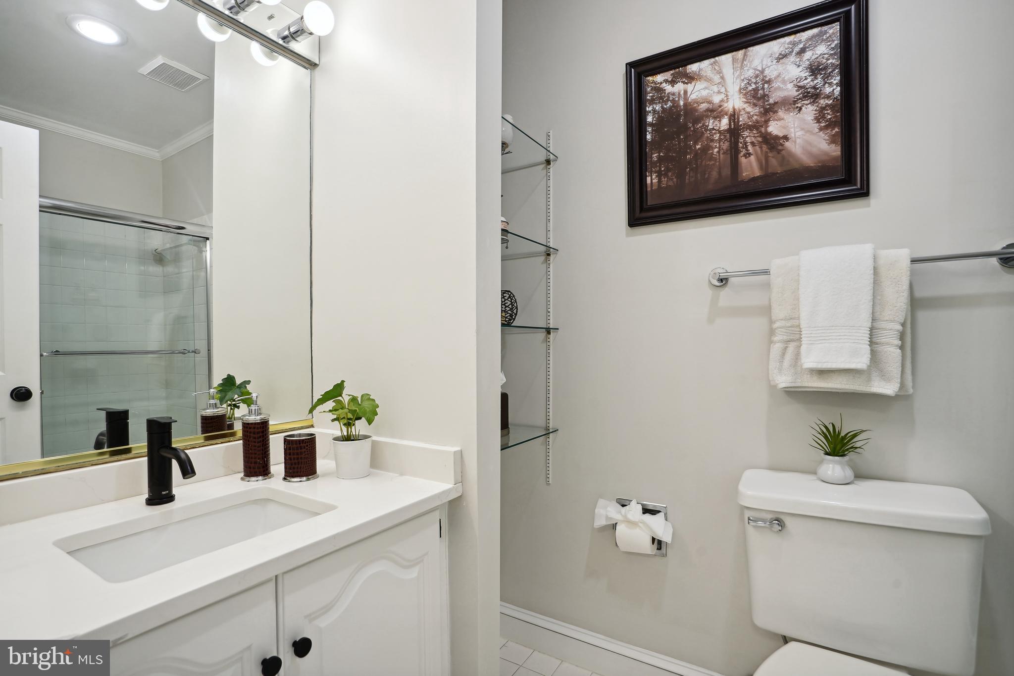 5809 Tudor Lane Rockville, MD 20852 - Photo 21 of 42 2nd Bathroom - new carrara quartz counter, hardwar