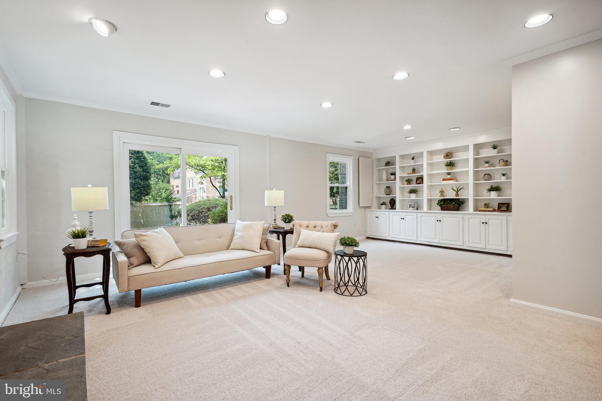 5809 Tudor Lane Rockville, MD 20852 - Photo 28 of 42 Lower Level Living Room - walk-out to patio