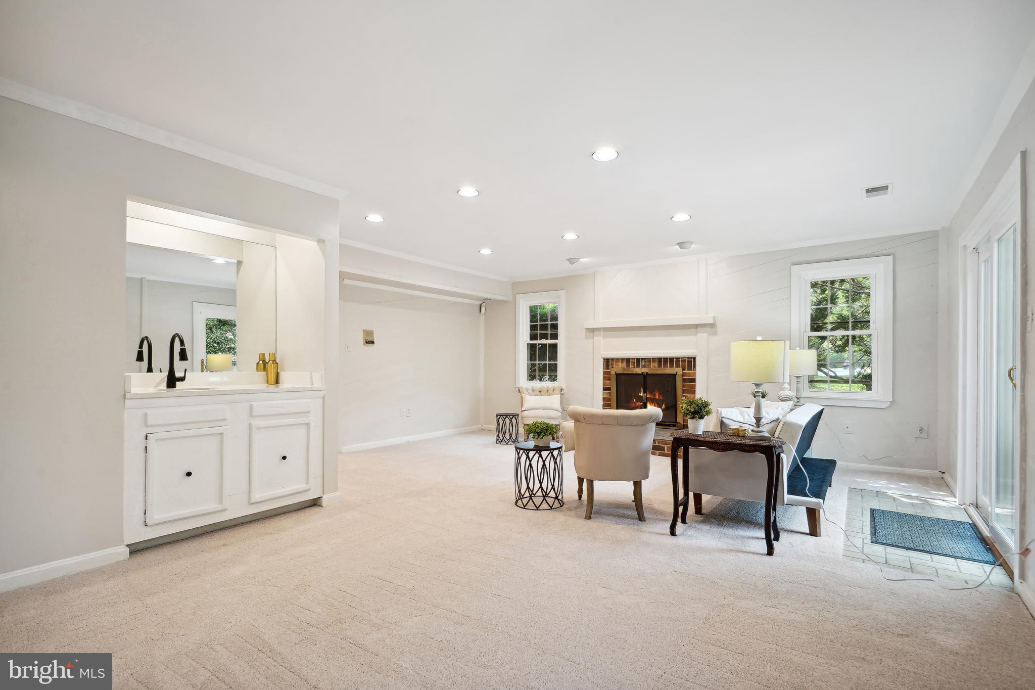 5809 Tudor Lane Rockville, MD 20852 - Photo 30 of 42 Lower Level Living Rm - wet bar, walk-out to patio