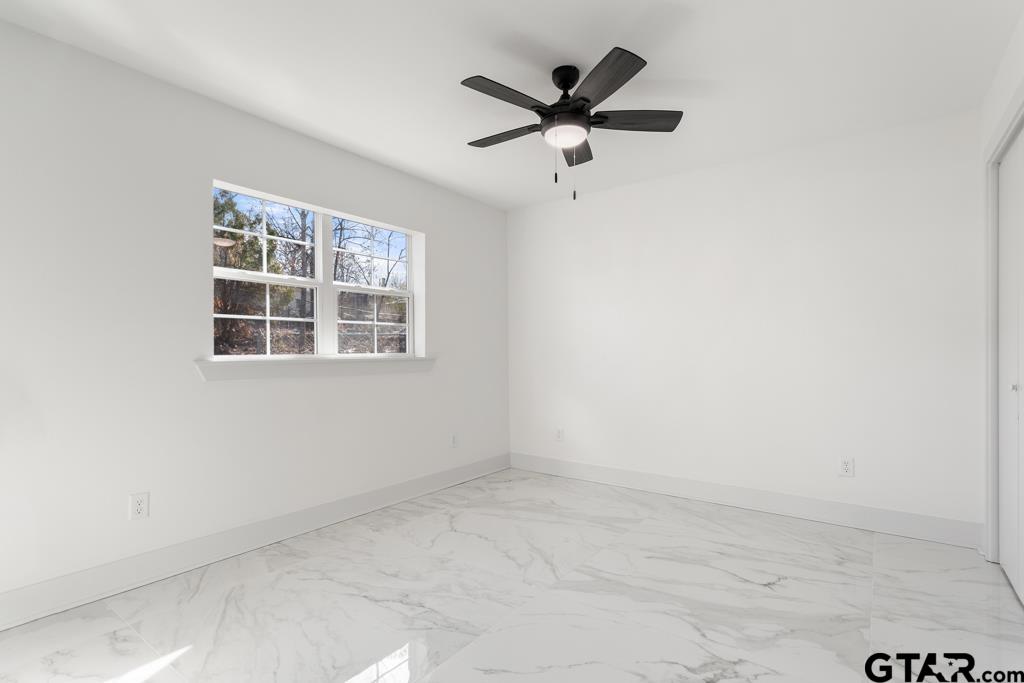 1608 Austin Drive Tyler, TX 75701 - Photo 21 of 36 an empty room with a window