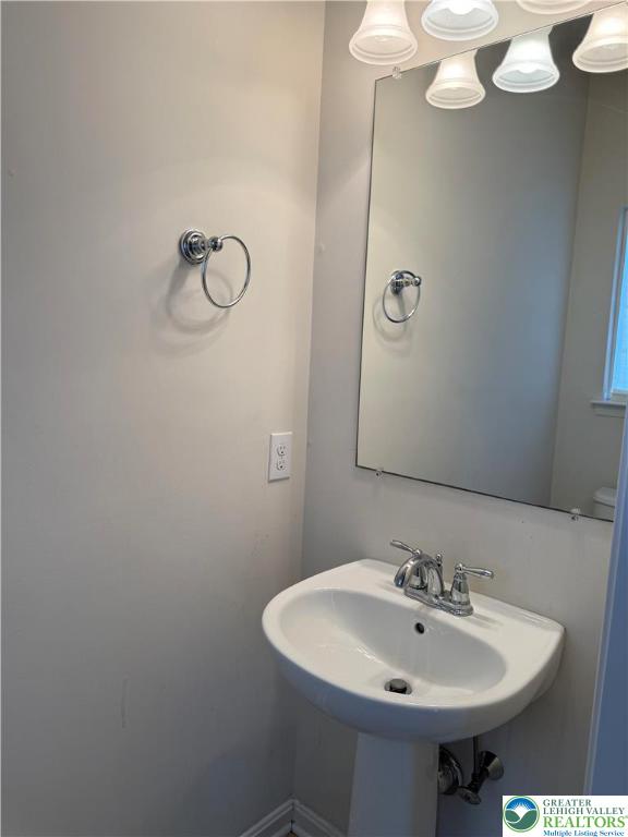 1805 Hemming Way Orefield, PA 18069 - Photo 17 of 24 a bathroom with a sink a mirror and shower