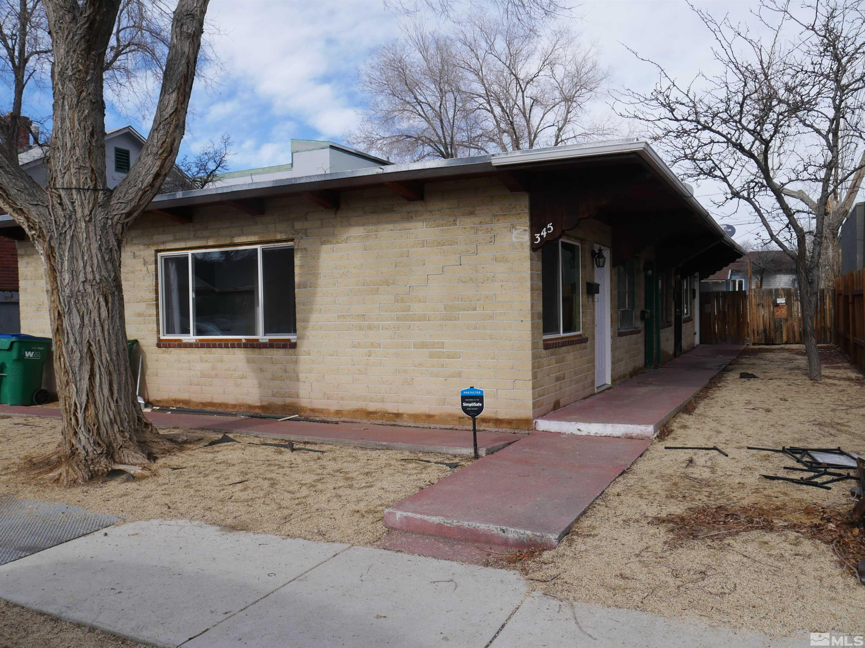 341 East Taylor Street, Unit 14 Reno, NV 89502 - Photo 1 of 1 a view of a car parked in front of a house