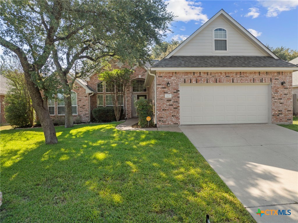 2807 Amber Forest Trail Belton, TX 76513 - Photo 5 of 40 a view of a big house with a big yard and large tree