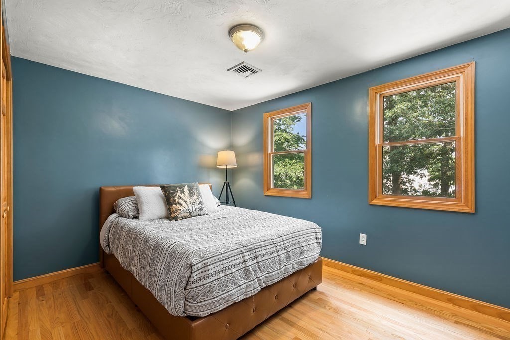 11 Amherst Road Stoughton, MA 02072 - Photo 16 of 42 a bedroom with a bed and a window