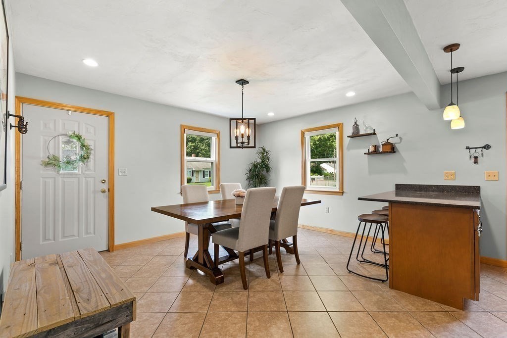11 Amherst Road Stoughton, MA 02072 - Photo 29 of 42 a dining room with furniture and window