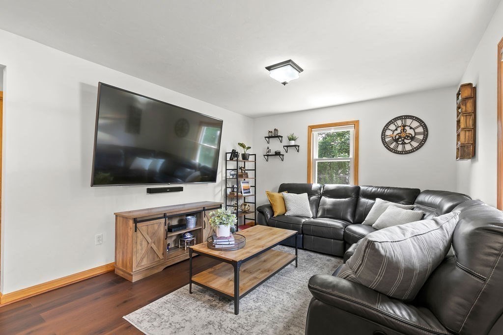 11 Amherst Road Stoughton, MA 02072 - Photo 31 of 42 a living room with furniture and a flat screen tv