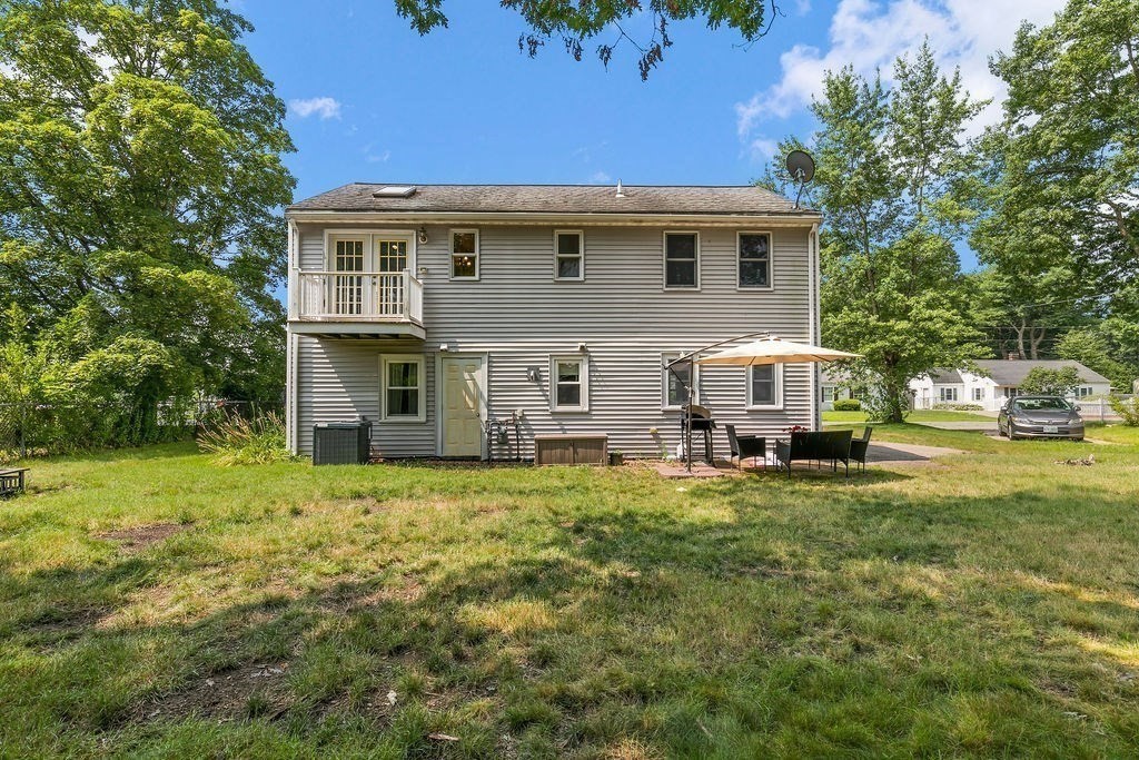 11 Amherst Road Stoughton, MA 02072 - Photo 35 of 42 a view of a house with a yard