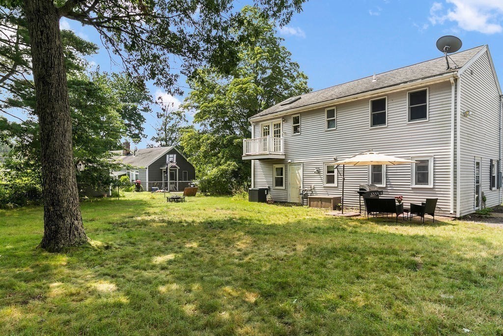 11 Amherst Road Stoughton, MA 02072 - Photo 36 of 42 a view of a house with a yard