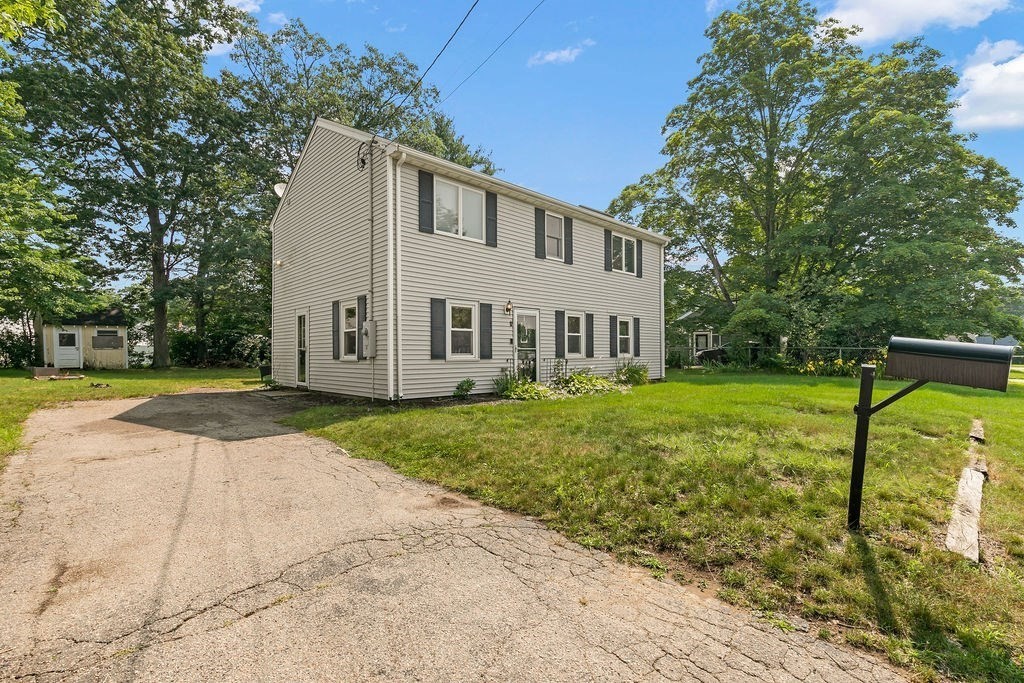 11 Amherst Road Stoughton, MA 02072 - Photo 39 of 42 a view of a house with backyard and sitting area