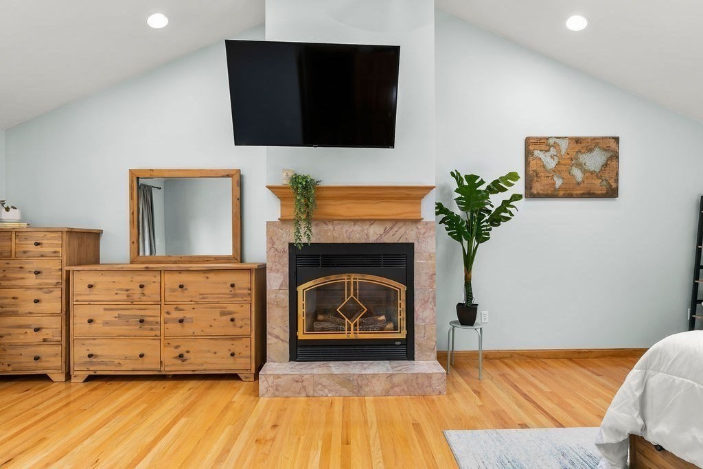 11 Amherst Road Stoughton, MA 02072 - Photo 9 of 42 a living room with furniture and a fireplace