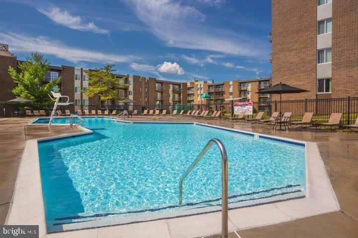 4 South Van Dorn Street, Unit 503 Alexandria, VA 22304 - Photo 18 of 21 a view of a swimming pool with outdoor seating