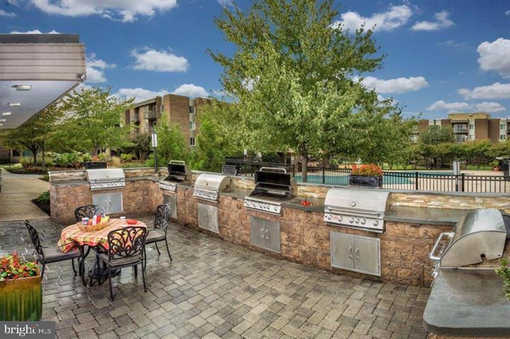4 South Van Dorn Street, Unit 503 Alexandria, VA 22304 - Photo 19 of 21 a view of a chairs and table in a patio