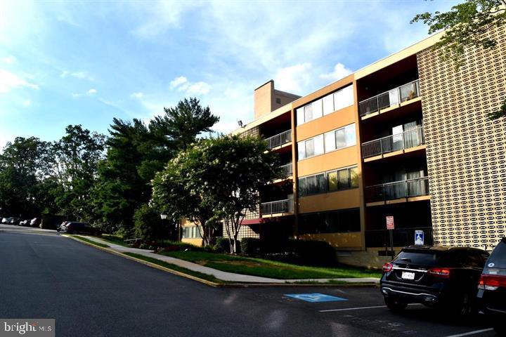4 South Van Dorn Street, Unit 503 Alexandria, VA 22304 - Photo 7 of 21 a street view along with residential houses