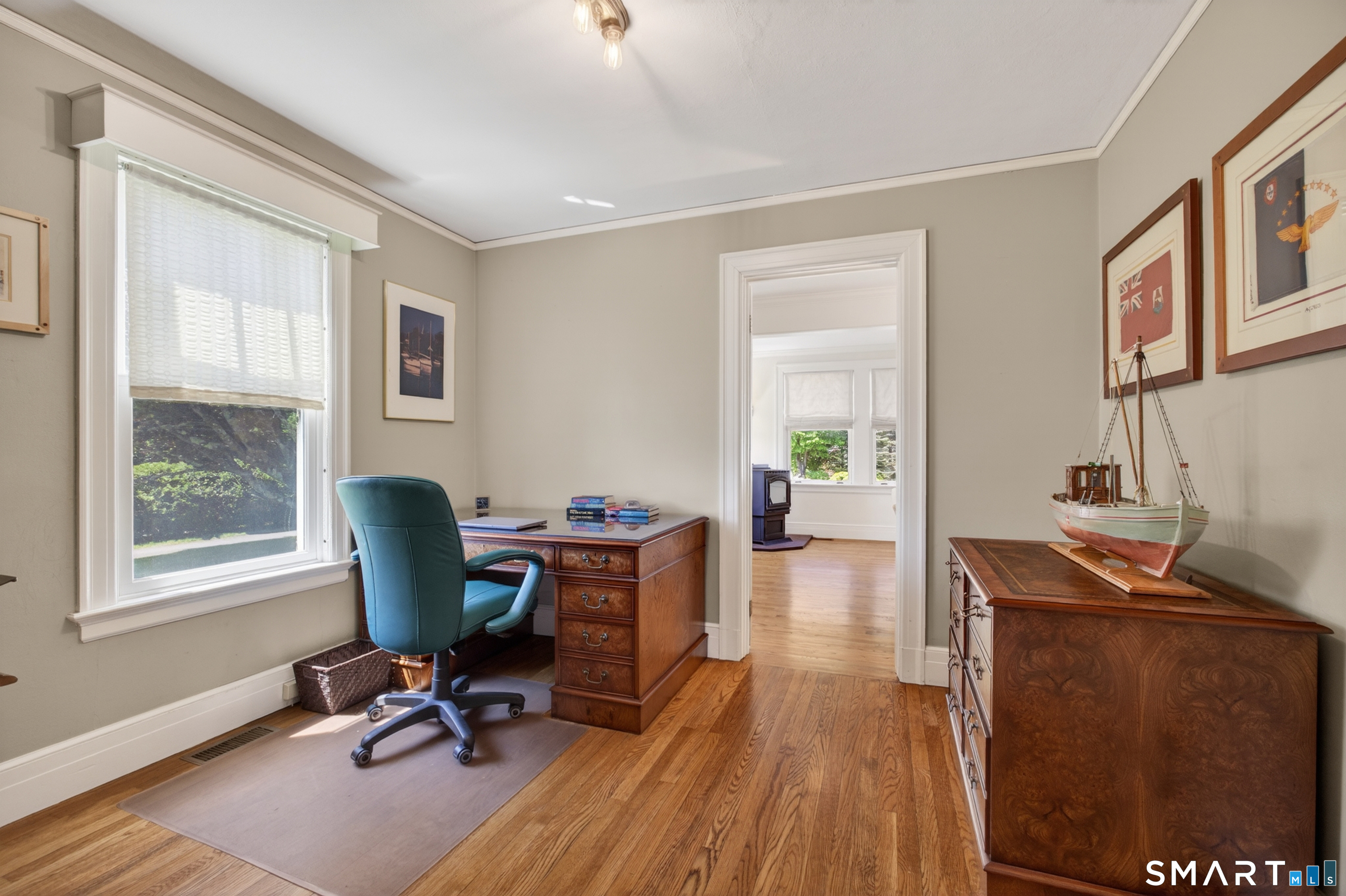 10 Prospect Street Groton, CT 06355 - Photo 8 of 40 a view of a workspace with furniture and a window
