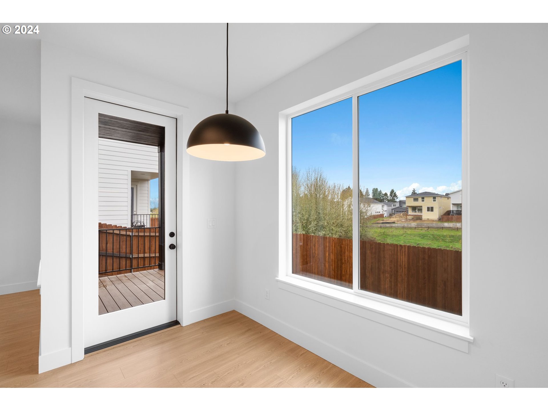 910 Northwest 175th Way Ridgefield, WA 98642 - Photo 5 of 16 a view of an empty room with a window