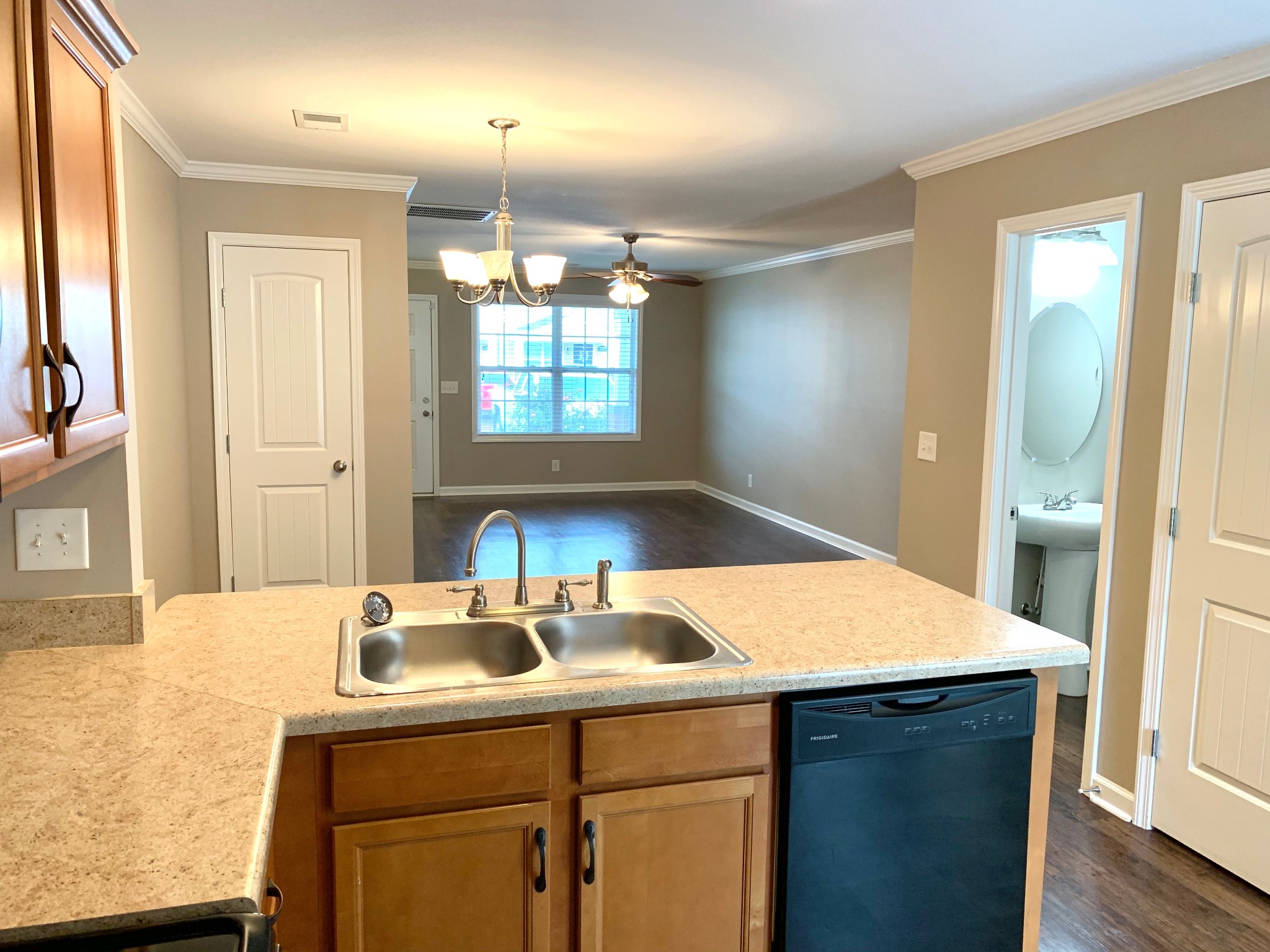 318 Sam Houston Circle Clarksville, TN 37040 - Photo 6 of 20 a kitchen with a sink cabinets and wooden floor