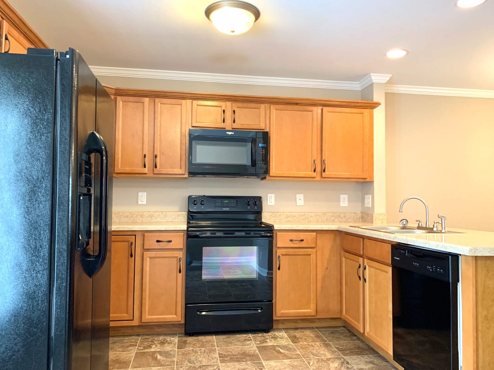 318 Sam Houston Circle Clarksville, TN 37040 - Photo 9 of 20 a kitchen with a sink appliances and cabinets