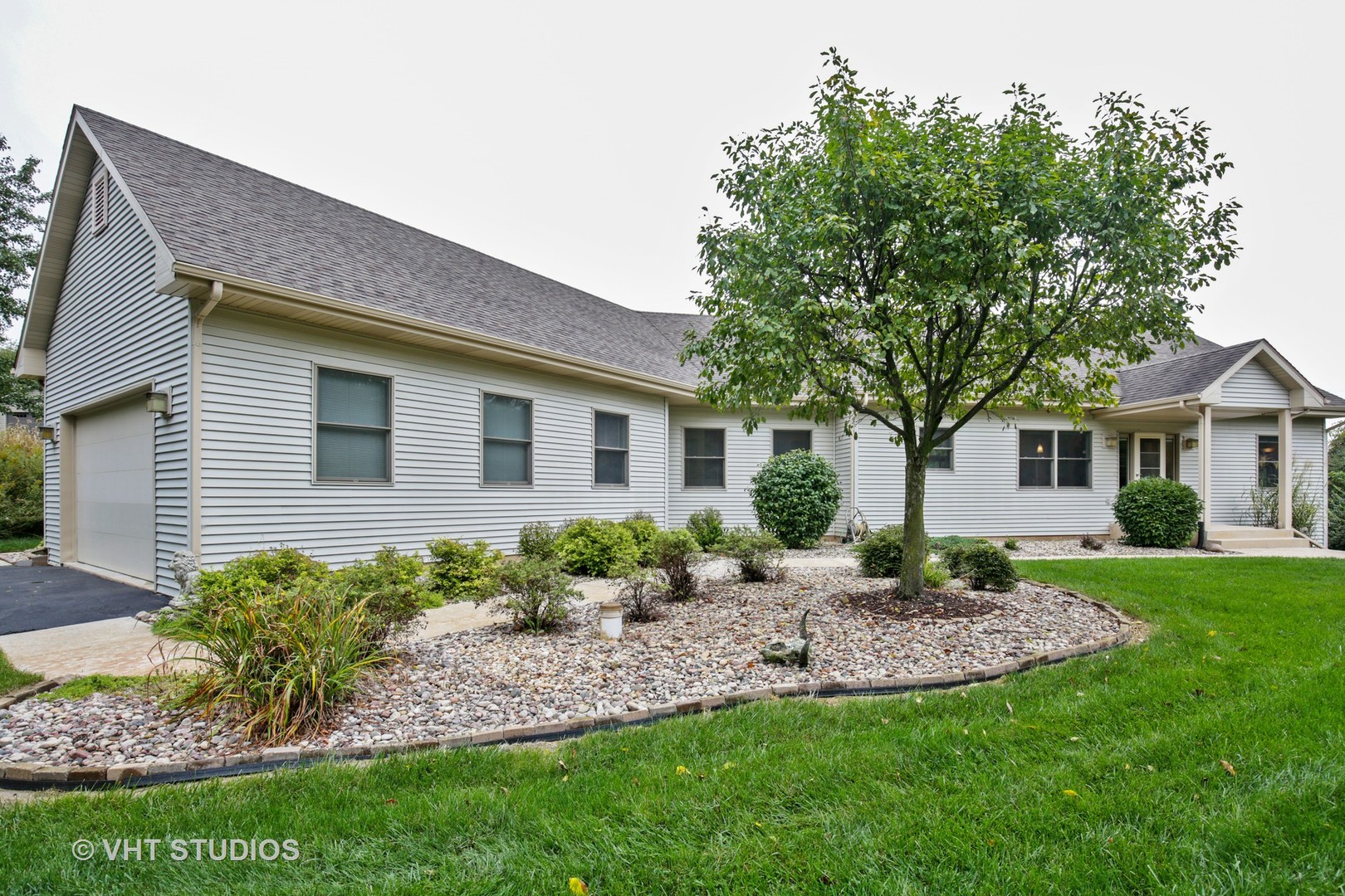 35W698 Ridge Road Dundee, IL 60102 - Photo 1 of 12 a front view of a house with a garden