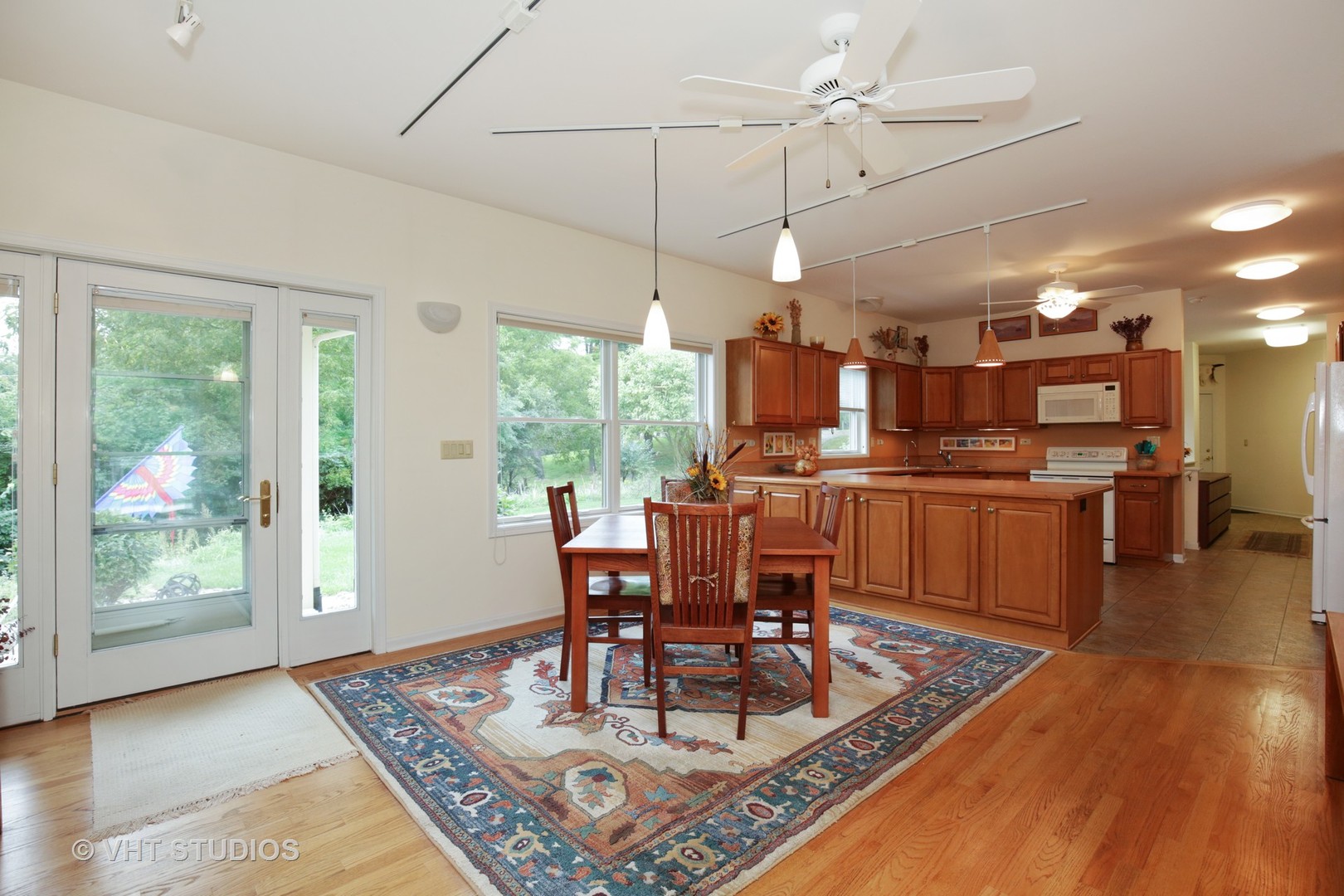 35W698 Ridge Road Dundee, IL 60102 - Photo 5 of 12 a view of a dining room with furniture window and wooden floor