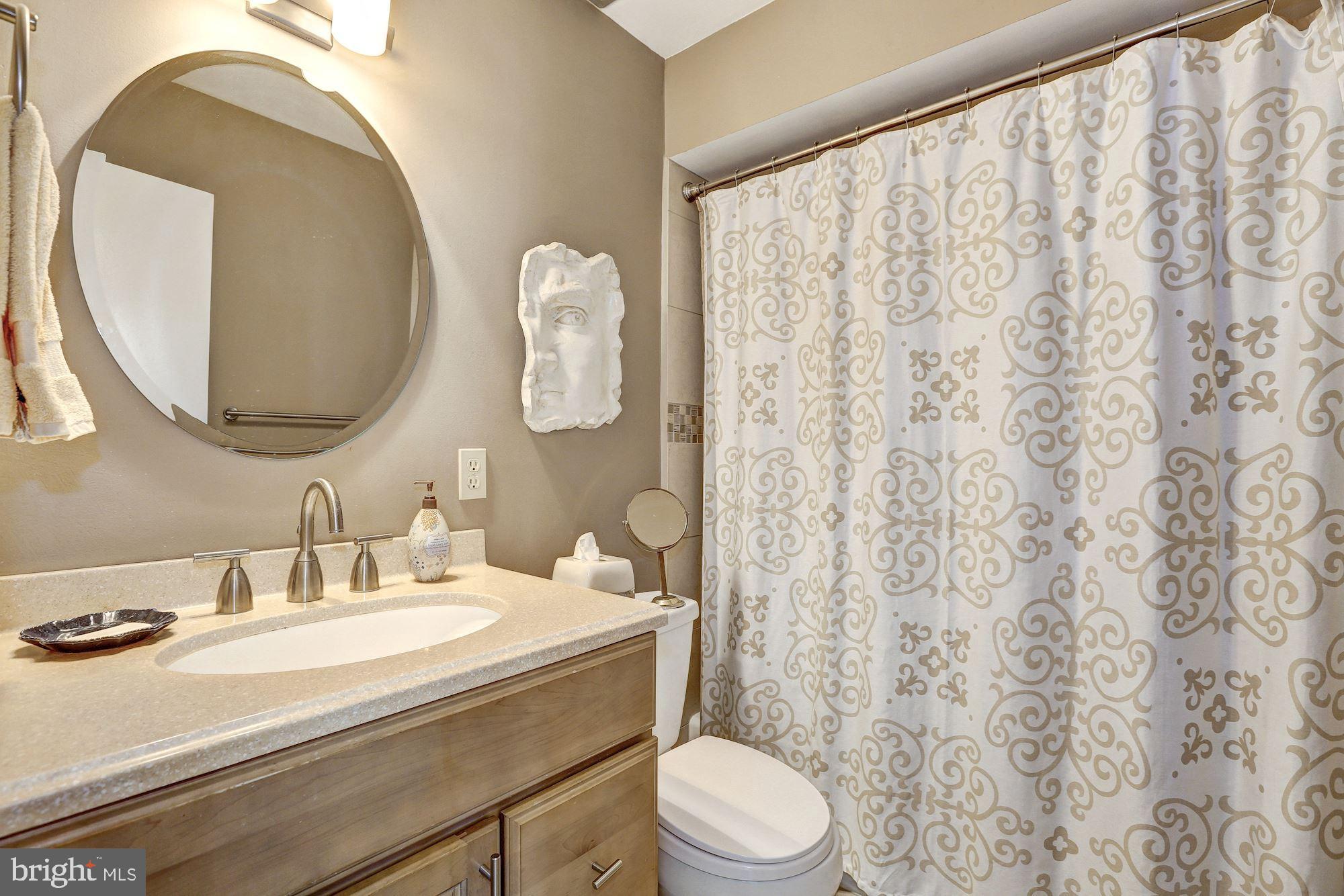 15128 Middlegate Road Silver Spring, MD 20905 - Photo 13 of 17 Hall bath upper level, tub/shower