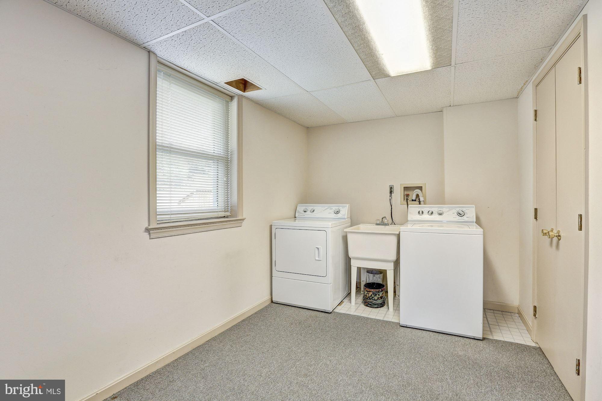15128 Middlegate Road Silver Spring, MD 20905 - Photo 14 of 17 Large Laundry room off family room