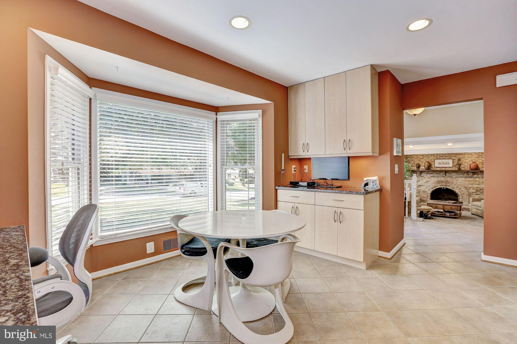 15128 Middlegate Road Silver Spring, MD 20905 - Photo 4 of 17 Light, bright kitchen, tile floor, bay window