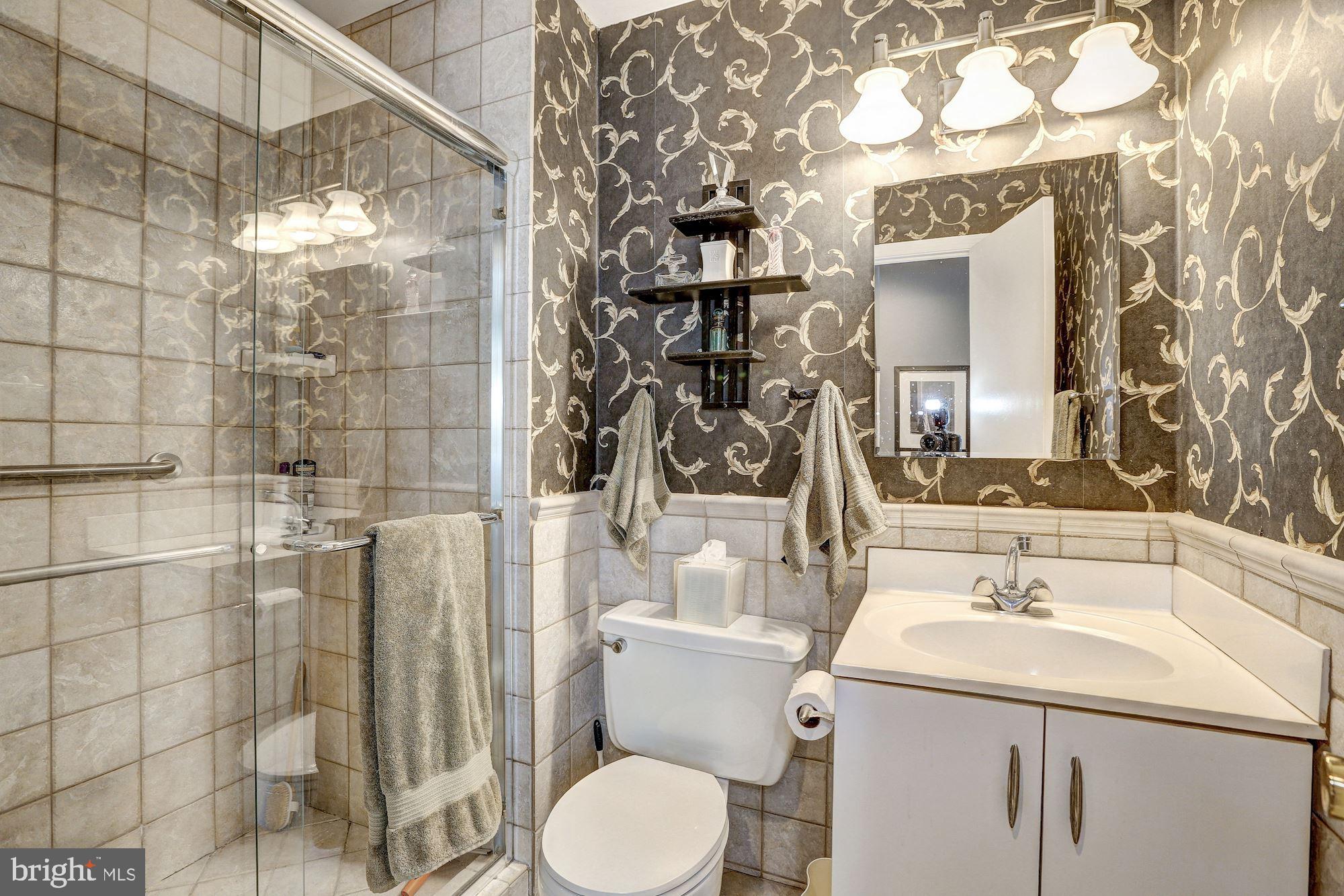 15128 Middlegate Road Silver Spring, MD 20905 - Photo 10 of 17 Renovated Owner's bath