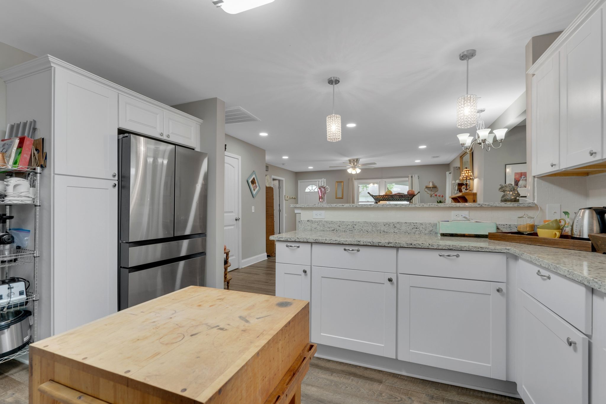610 Polk Street Manchester, TN 37355 - Photo 16 of 30 a kitchen with a refrigerator a sink and cabinets