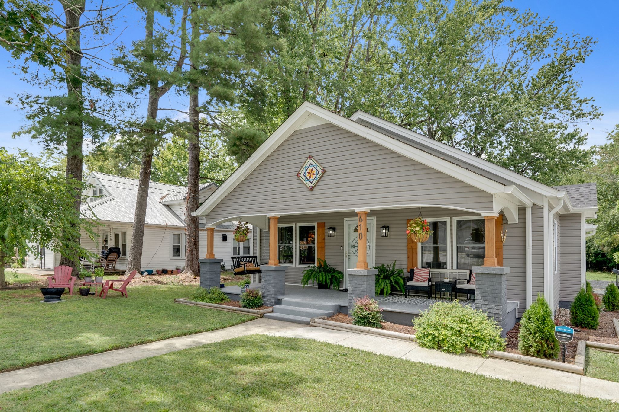 610 Polk Street Manchester, TN 37355 - Photo 2 of 30 a view of a house with a yard