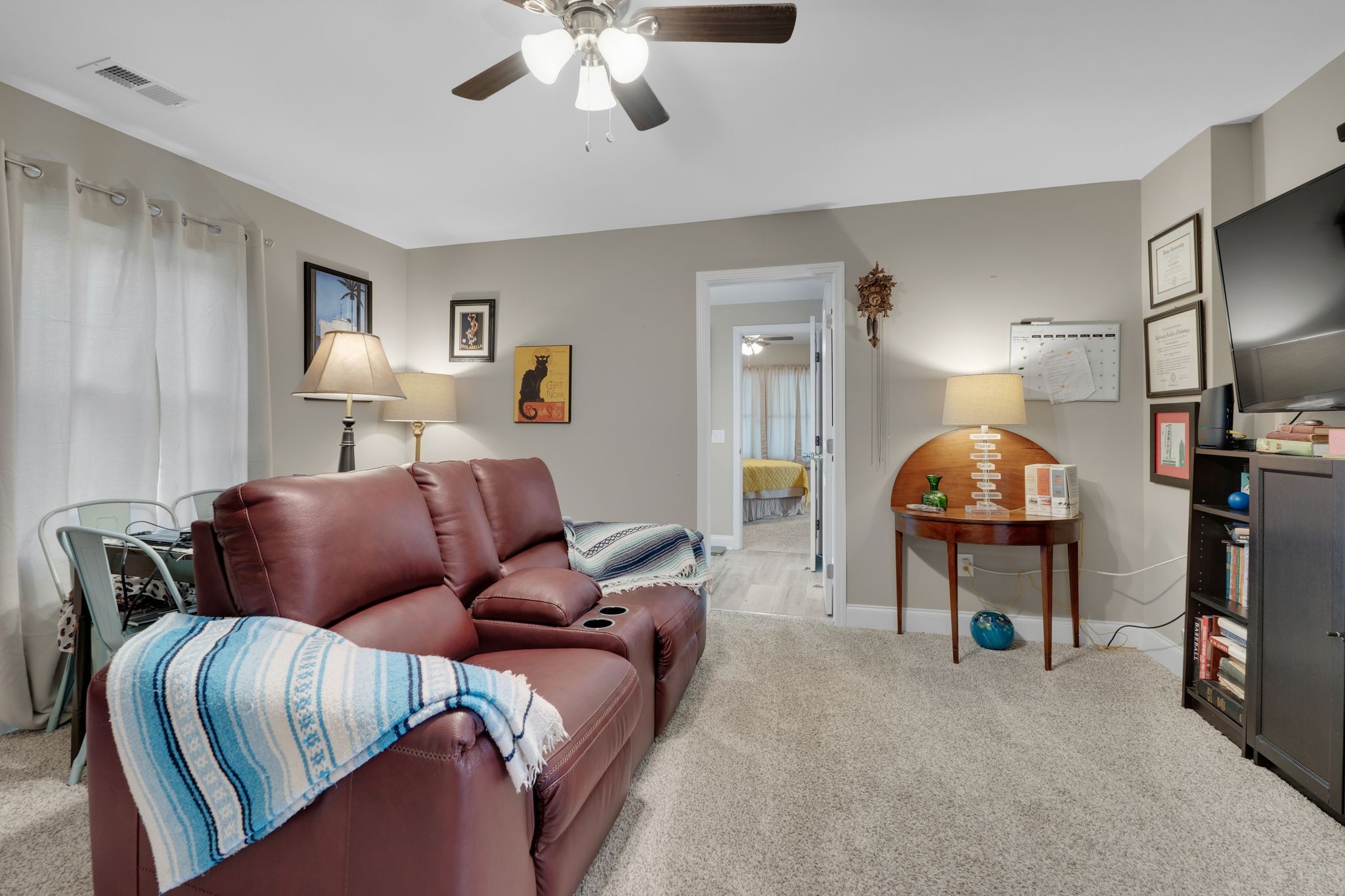 610 Polk Street Manchester, TN 37355 - Photo 22 of 30 a living room with furniture a lamp and a chandelier