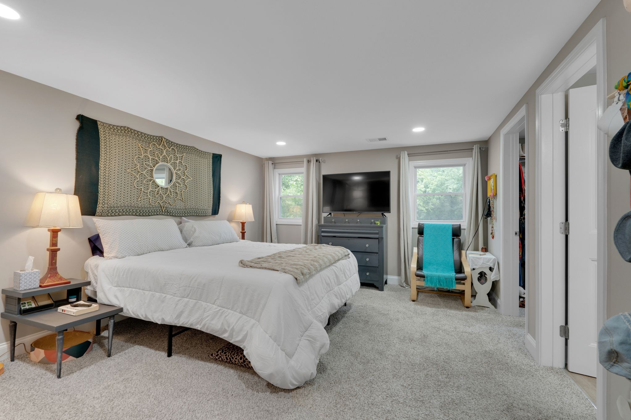 610 Polk Street Manchester, TN 37355 - Photo 23 of 30 a spacious bedroom with a bed and a flat screen television