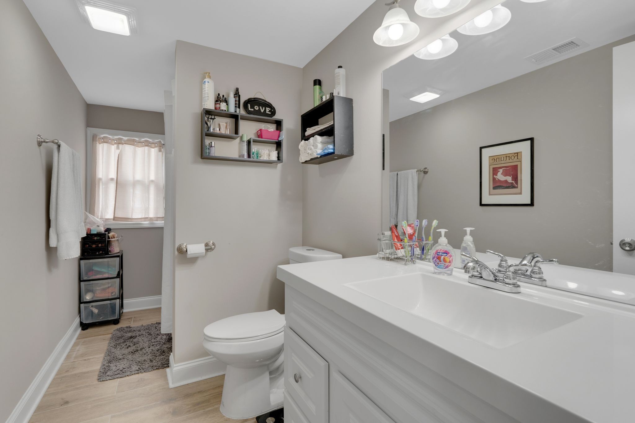 610 Polk Street Manchester, TN 37355 - Photo 26 of 30 a bathroom with a sink a toilet and shower