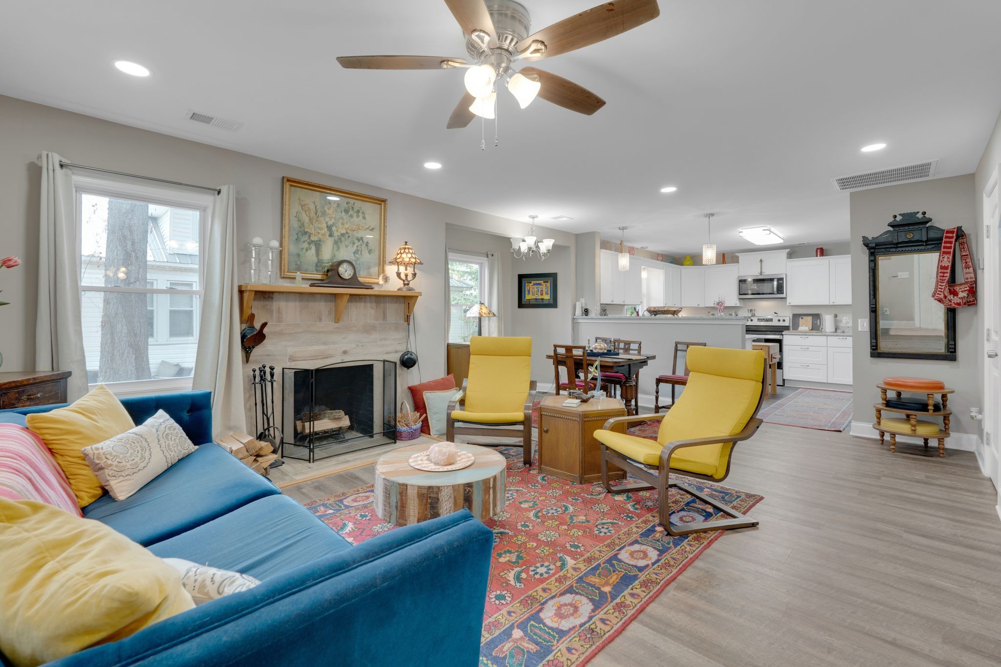 610 Polk Street Manchester, TN 37355 - Photo 7 of 30 a living room with furniture kitchen view and a fireplace