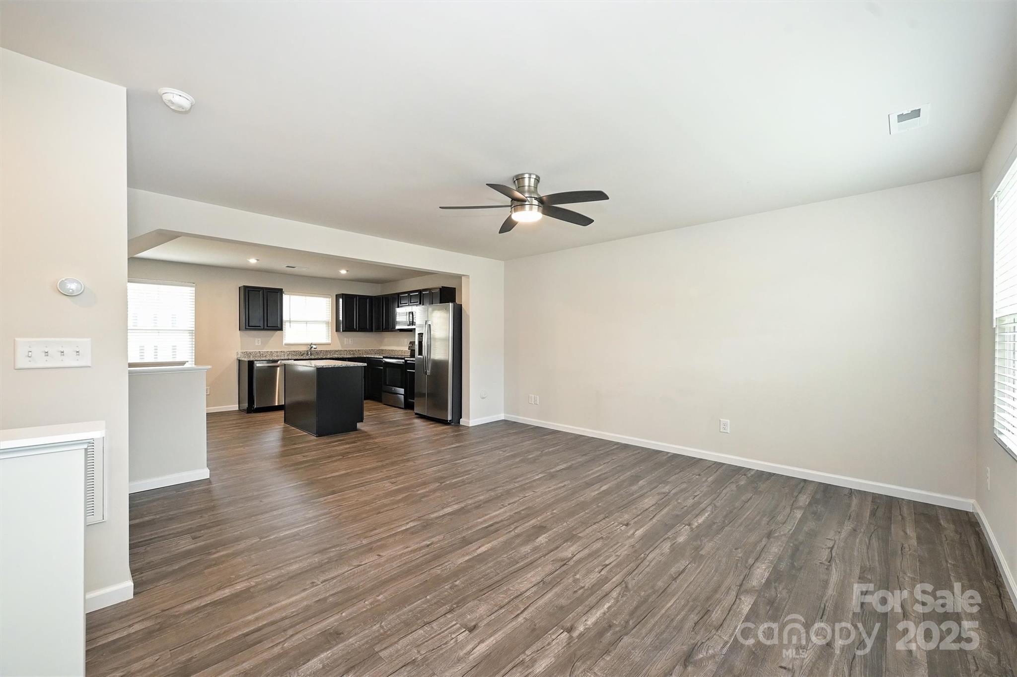 825 Renee Avenue Fort Mill, SC 29715 - Photo 19 of 30 a view of a kitchen with a sink and a refrigerator