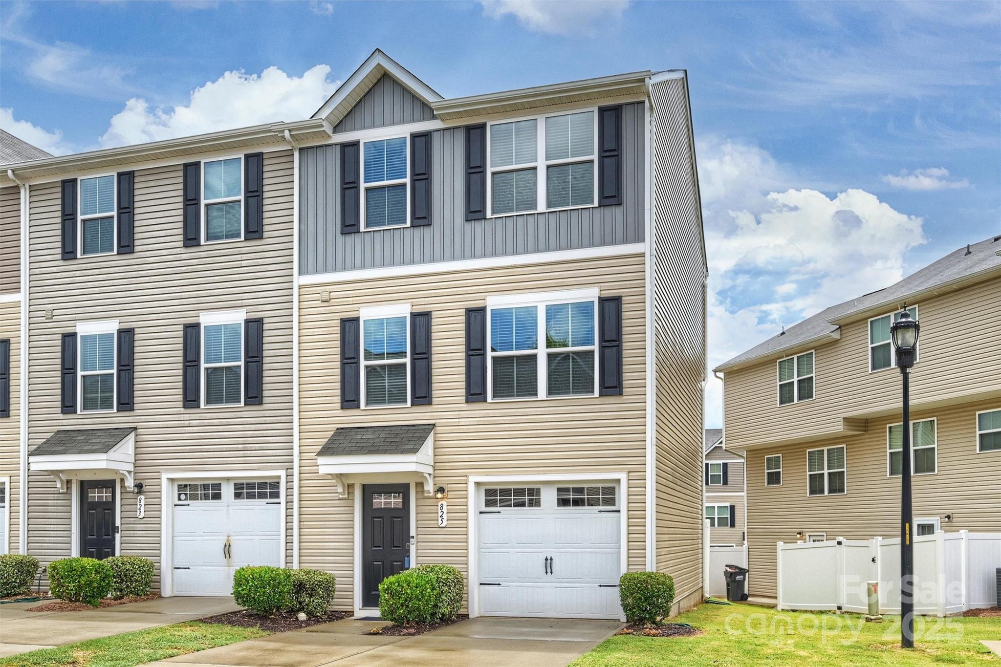 825 Renee Avenue Fort Mill, SC 29715 - Photo 2 of 30 a front view of a house with garden