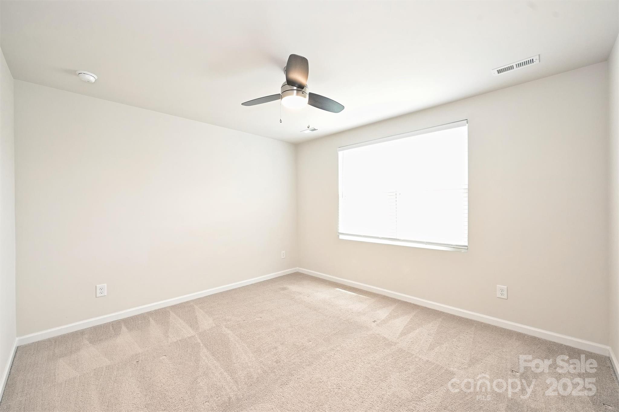 825 Renee Avenue Fort Mill, SC 29715 - Photo 21 of 30 a view of an empty room with a window