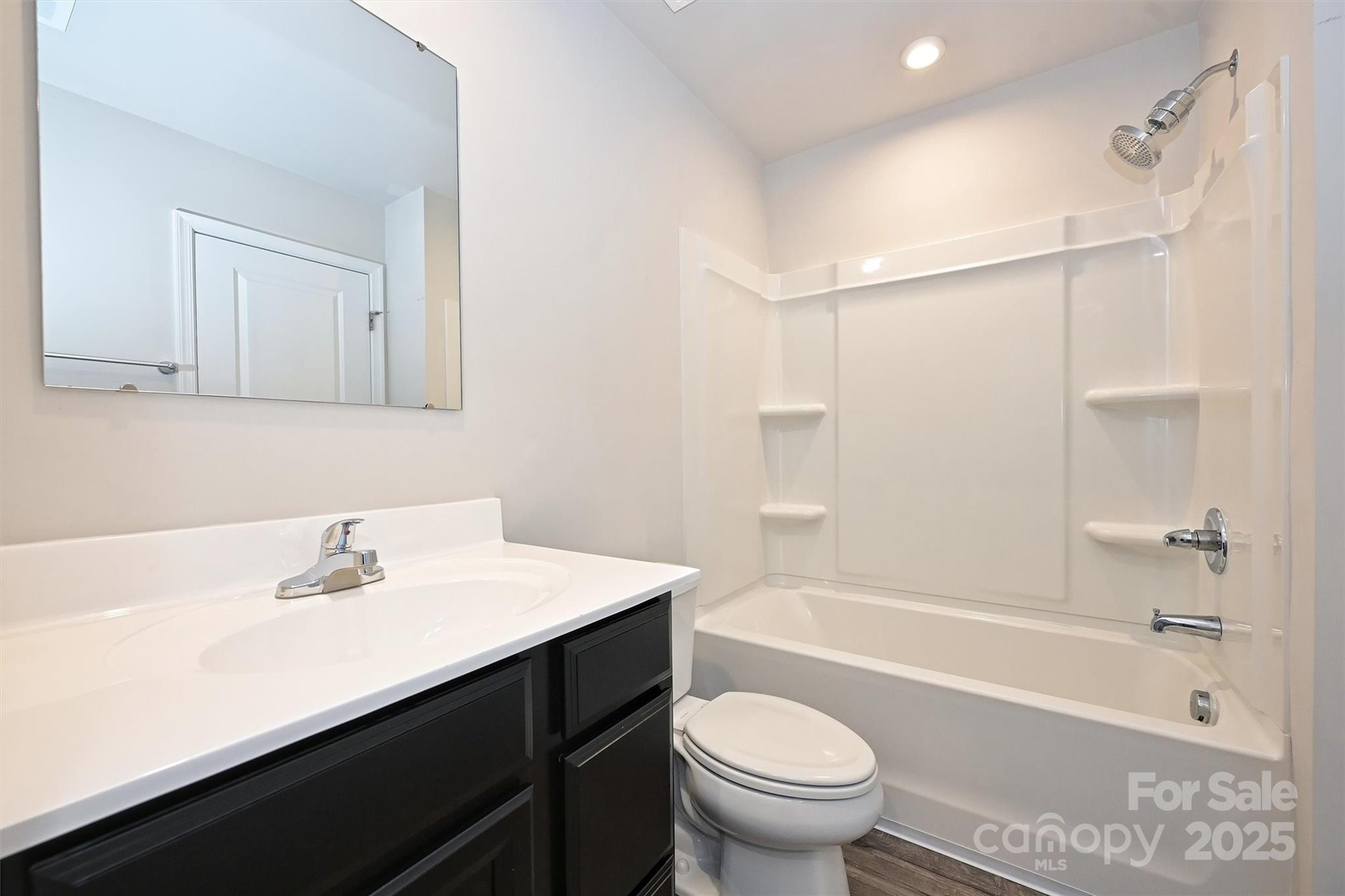 825 Renee Avenue Fort Mill, SC 29715 - Photo 23 of 30 a bathroom with a sink a toilet and shower